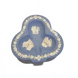 A vintage Wedgwood blue Jasperware clover-shaped trinket dish.